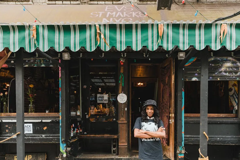 Portrait of Smiling Female Owner in Front of Cafe