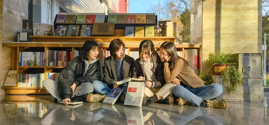 A Women Sitting on a Floor Reading Book Together 