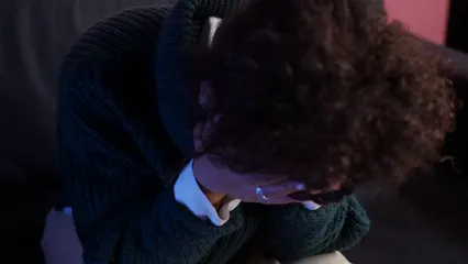 Horizontal video: A woman sitting on sofa feeling distressed 8410001. Duration: 35 seconds. Resolution: 1920x1080