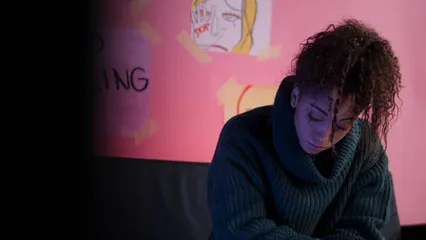 Horizontal video: Woman sitting on sofa looking problematic 8410060. Duration: 43 seconds. Resolution: 1920x1080